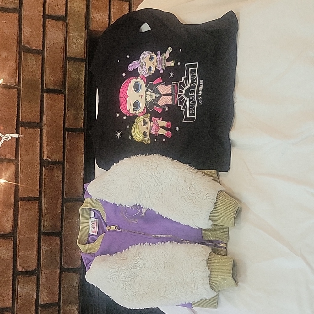 Lol Doll jacket and shirt size 4/5 purple and black in color.